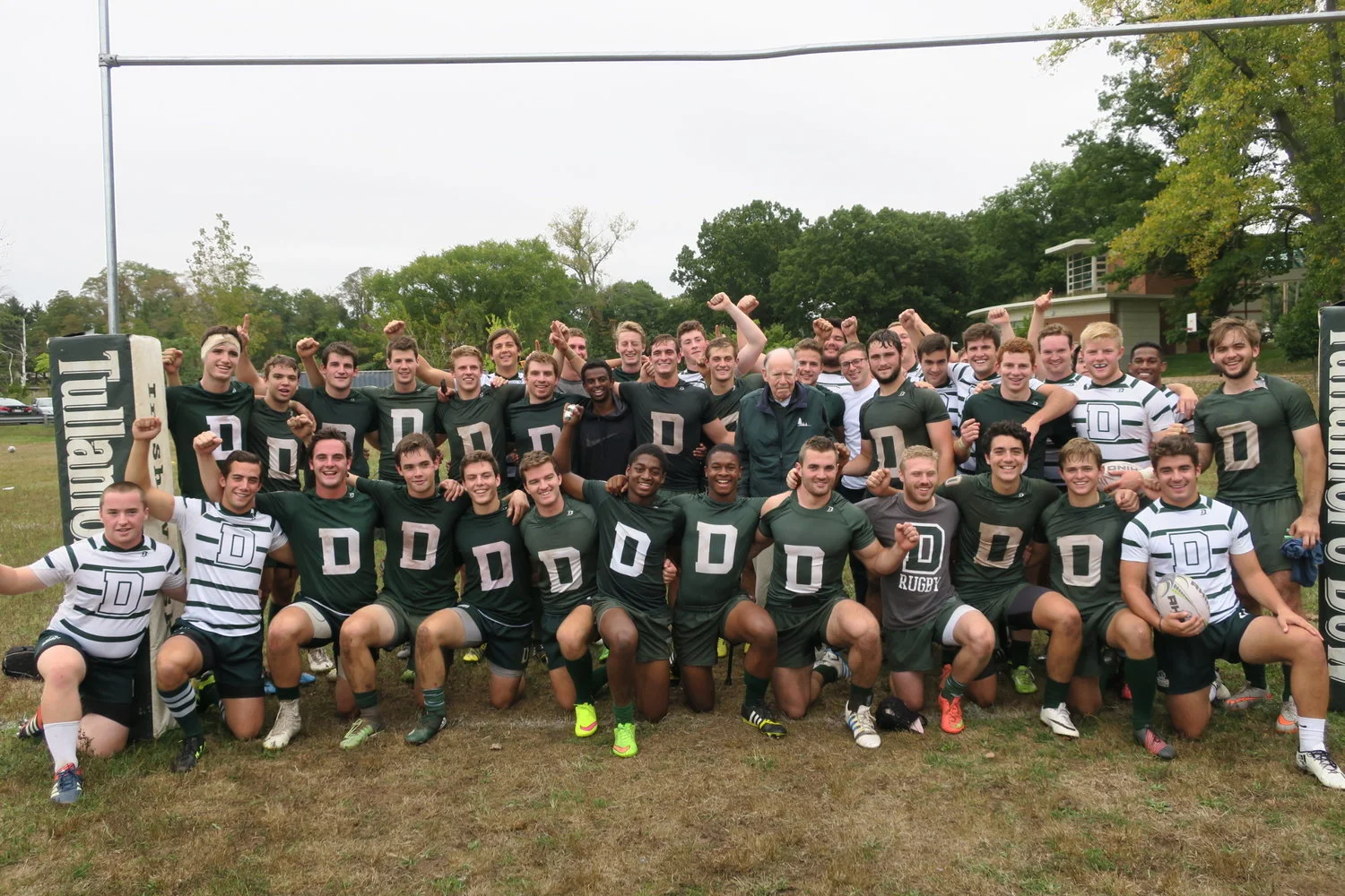 Above: Richard “Dick” Liesching (center) meets the 2016-17 side after a victory over Yale.