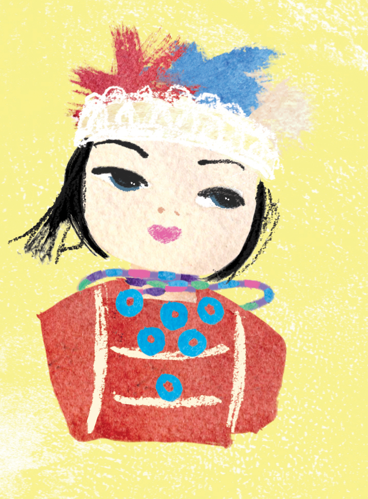 Cute cloth doll with beads and feathers