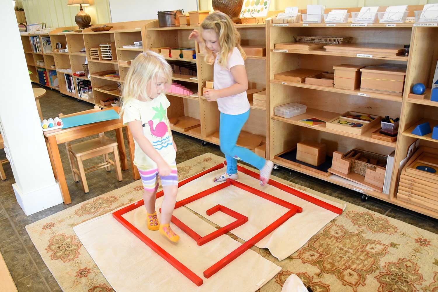 girls-playing-with-maze.jpg
