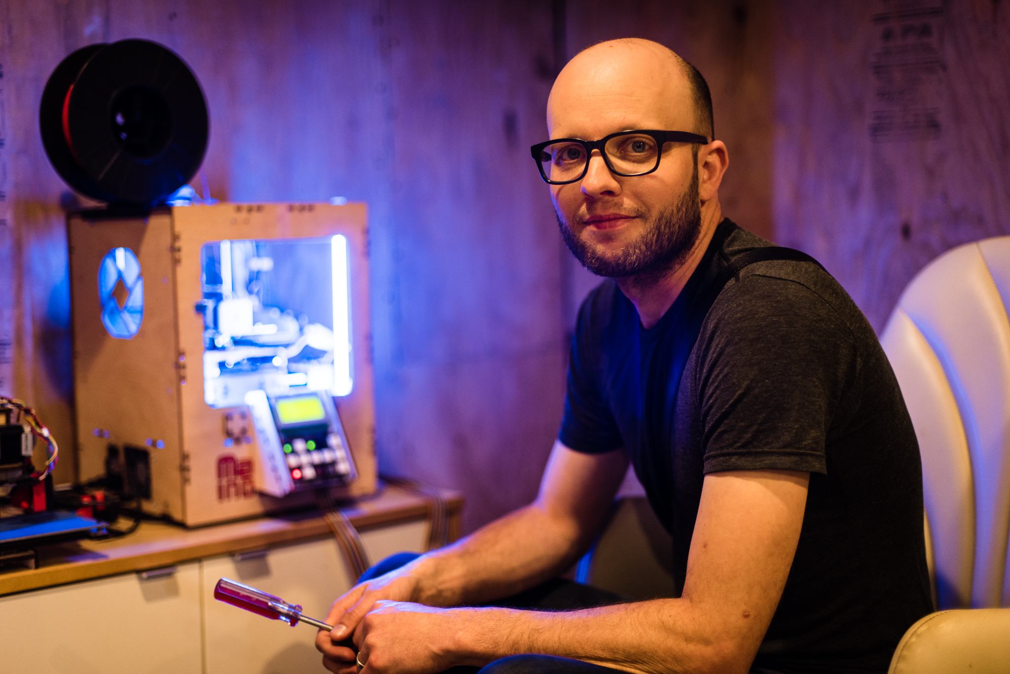 Lucas, in front of one of his printers. Photo: Ian Tuttle