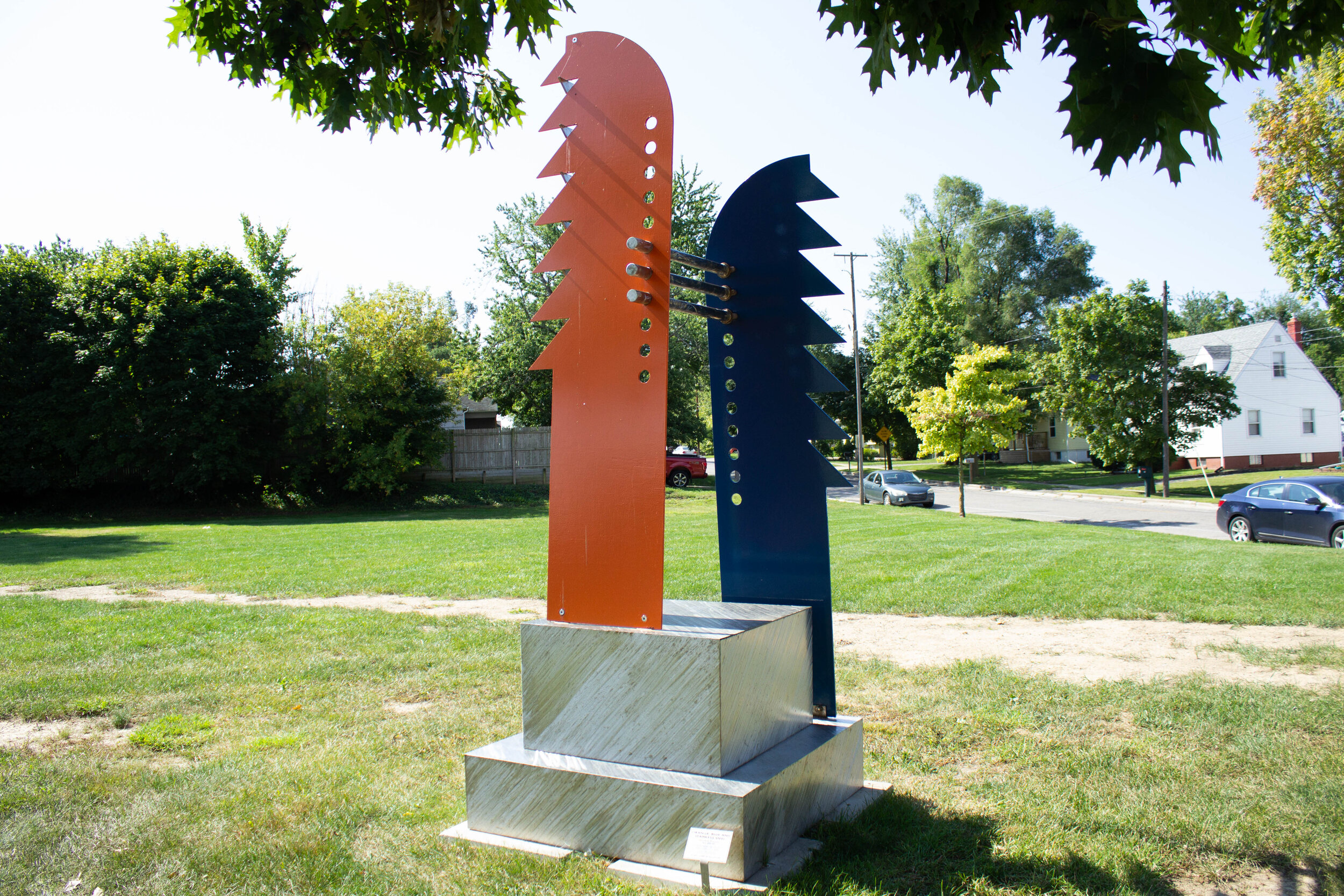 Orange, Blue, And Stainless Steel - Kenneth M. Thompson