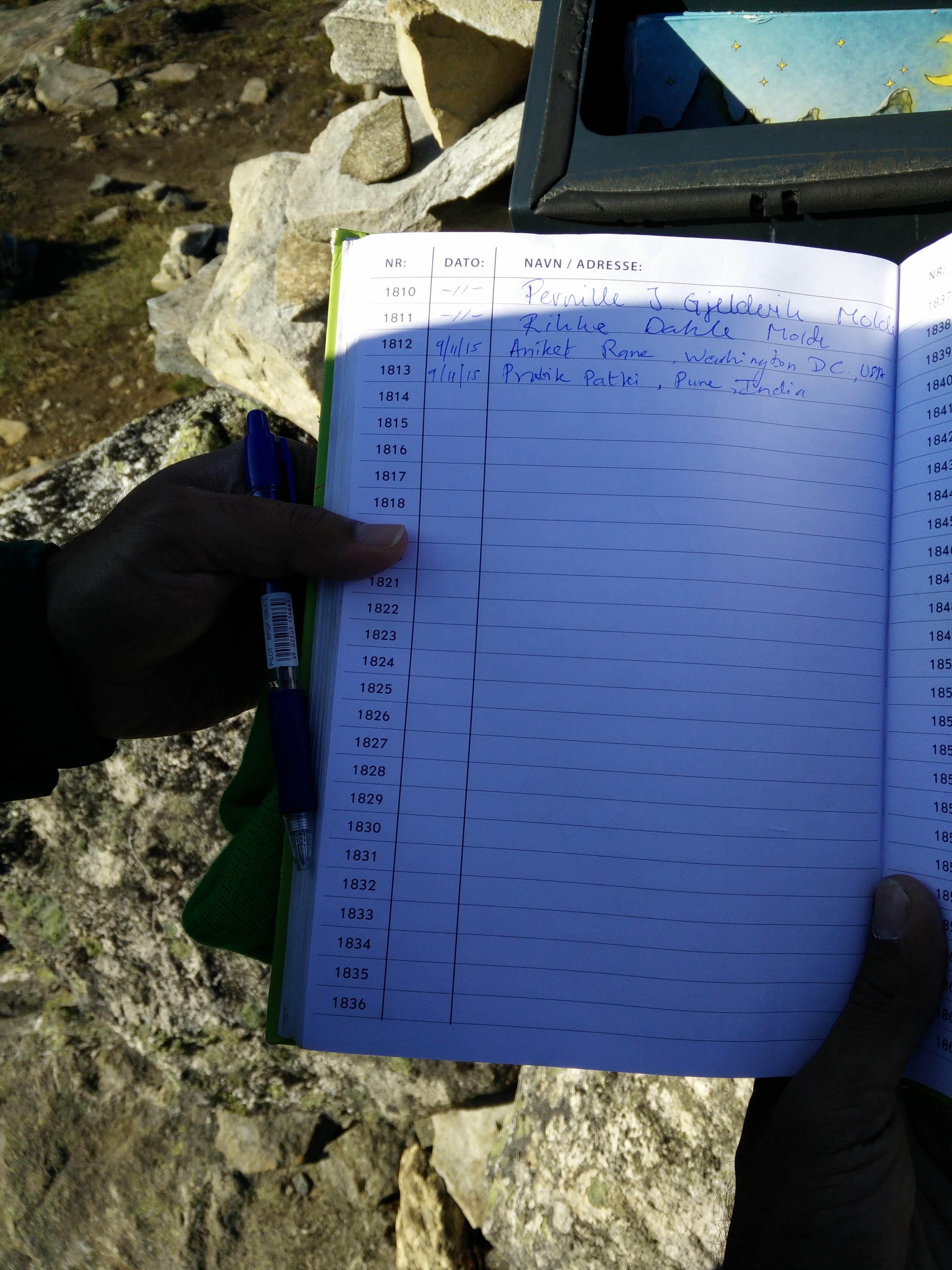 Penning down our names in the book - Visitor no 1812 and 1813