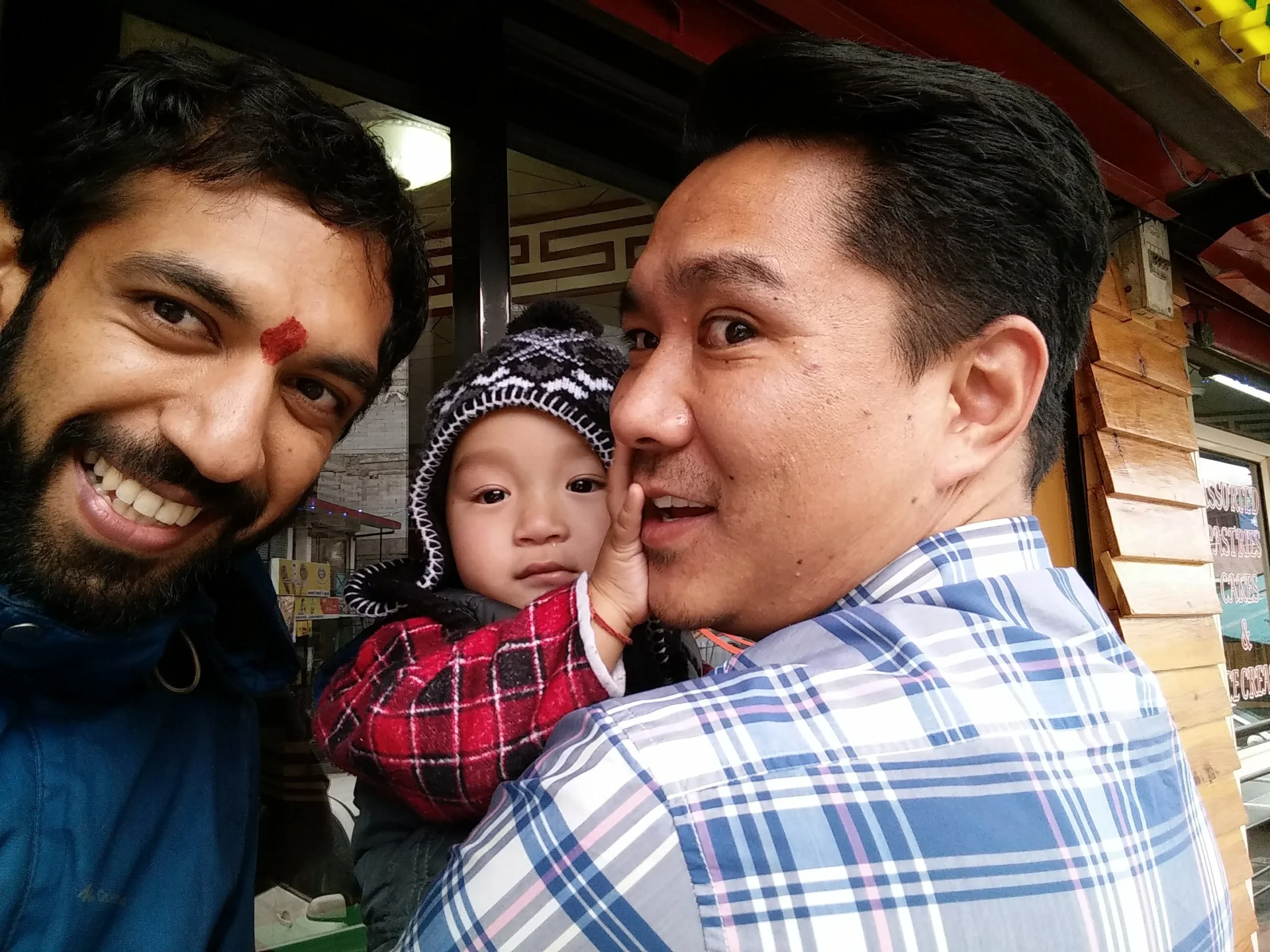 Met this sweet little kid Kechen and his uncle (who was the owner of the restaurant) at the coffee shop. Kechen was in the town for his holidays and is the same age as my nephew. Initially reluctant to even look at me, the moment he saw the camera, he did not want to go away. :) had a great time with him. 