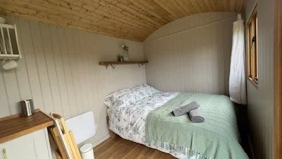 Shepherd hut bed.jpg