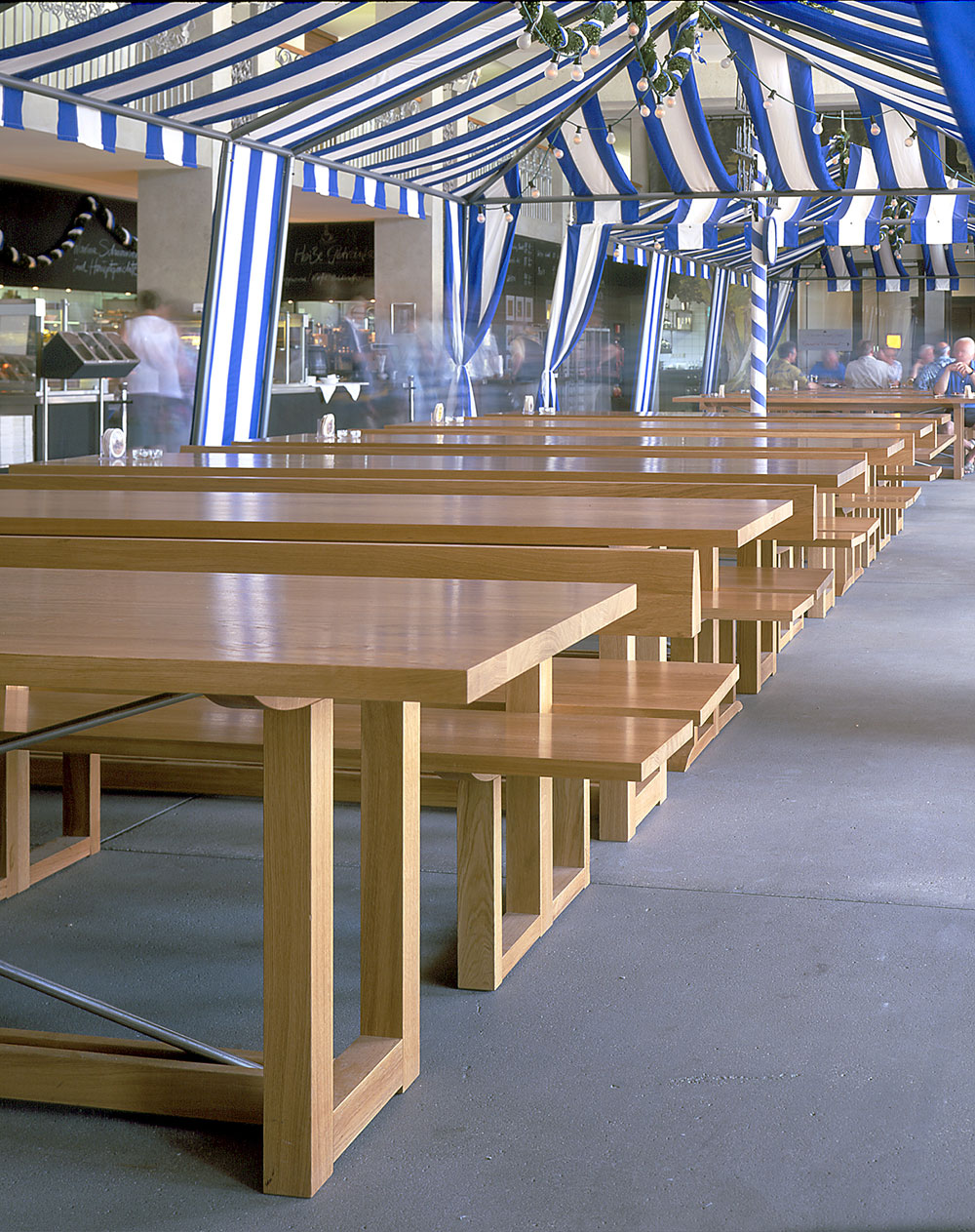 The most popular of the theatre's five restaurants is the beer garden we brought to Bavaria. The sturdy beech tables and benches are hardworking, comfortable and roomy, helping to create a convivial atmosphere.
