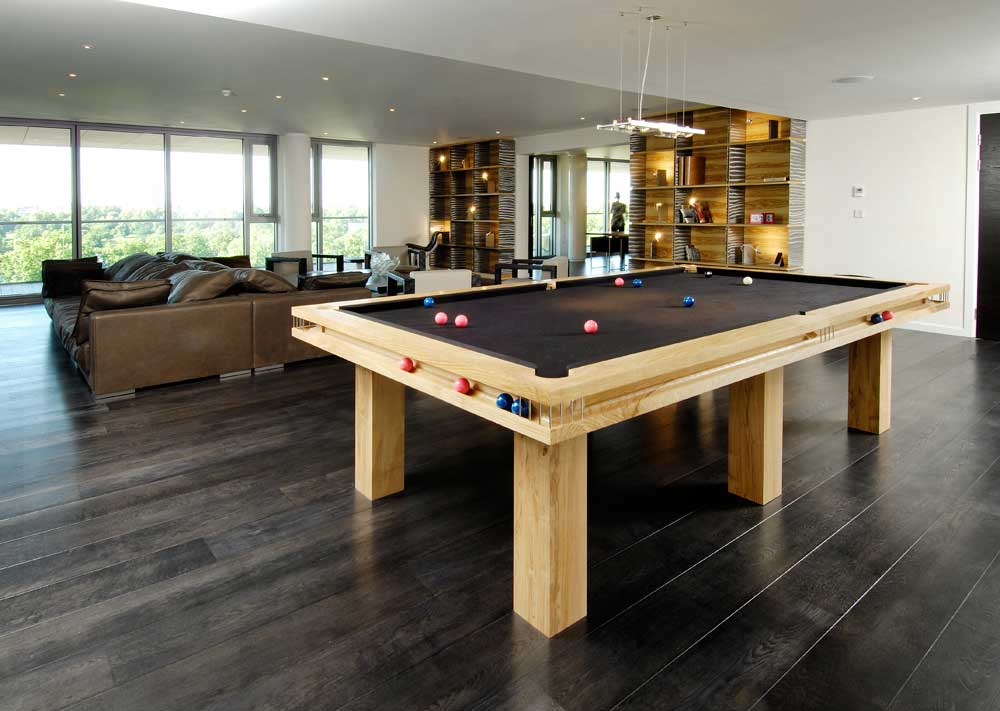 Another bespoke snooker table, this time in solid ash covered with striking black felt.