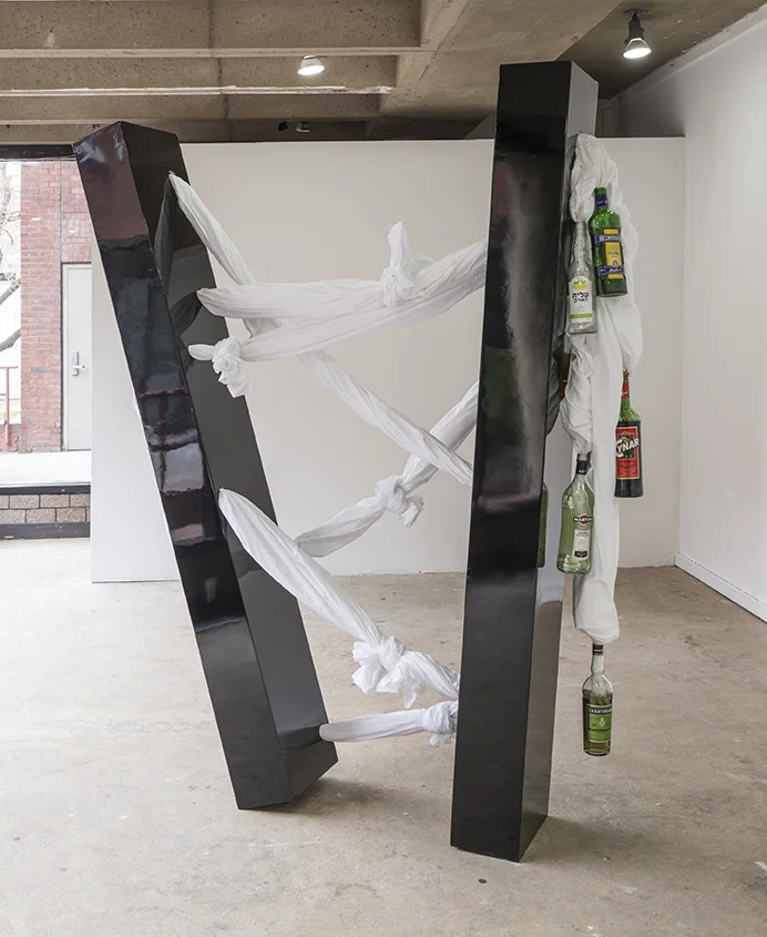 Sweat 4 (Tali) , 2015, Liquor bottles, bed sheets, metal, painted wood, 63'' x 84'' x 13''