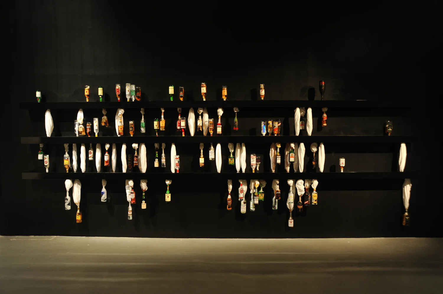 SWEAT , 2010, Full liquor bottles, bed sheets and shelves, Dimensions variable