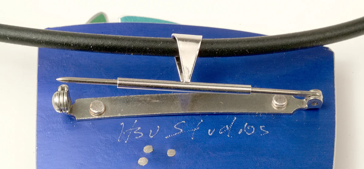 Slide tube onto pin stem.