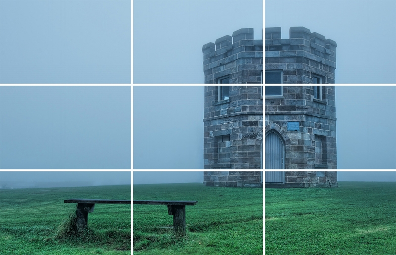 Notice how the main subject is left-heavy, or occupying more than 1/3 of the screen. There is also a bench in the foreground (lower 1/3) that creates depth.