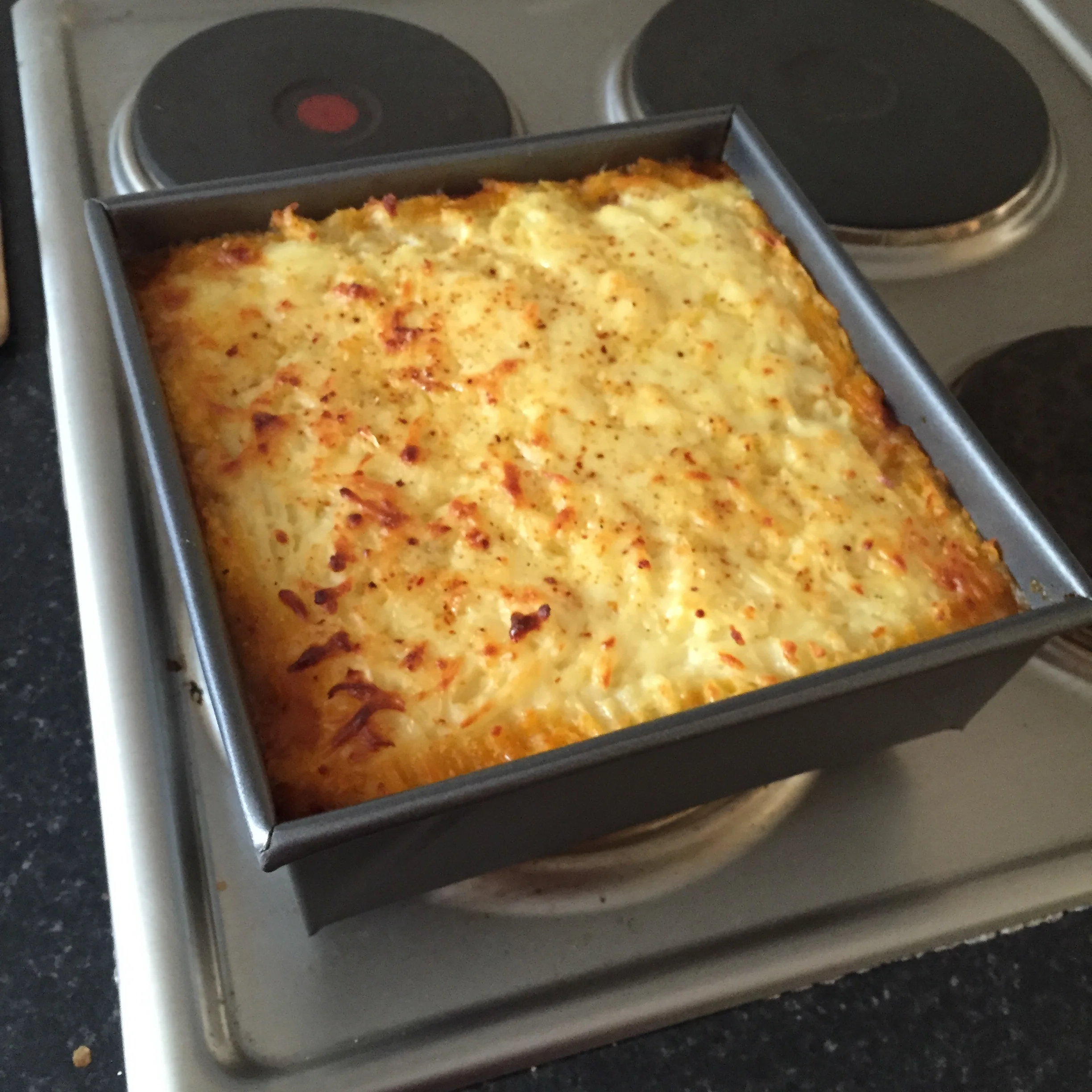 A hearty homemade cottage pie with a lovely cheddar/mozarella cheese baked crust on top. 