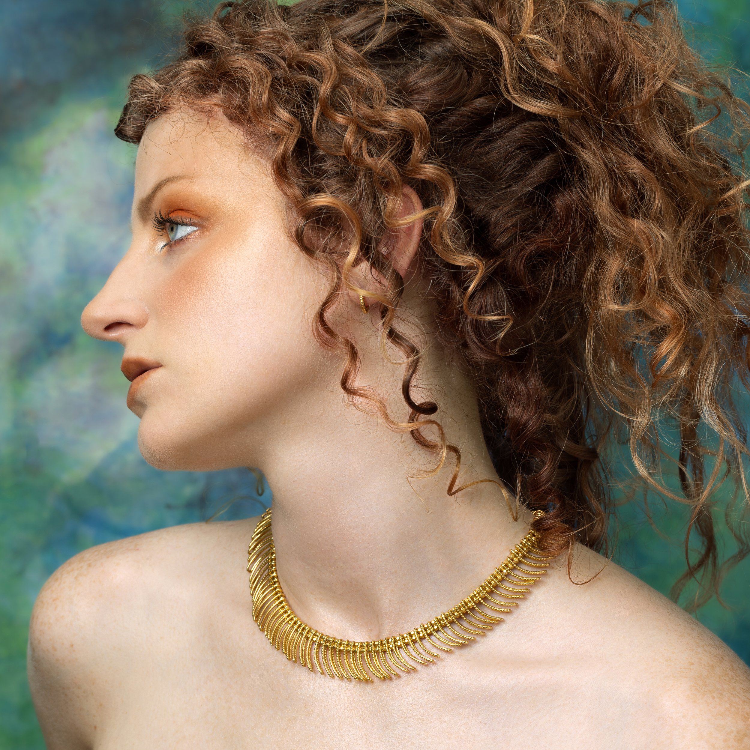 IMO-gold-collar2-SQ.jpg
