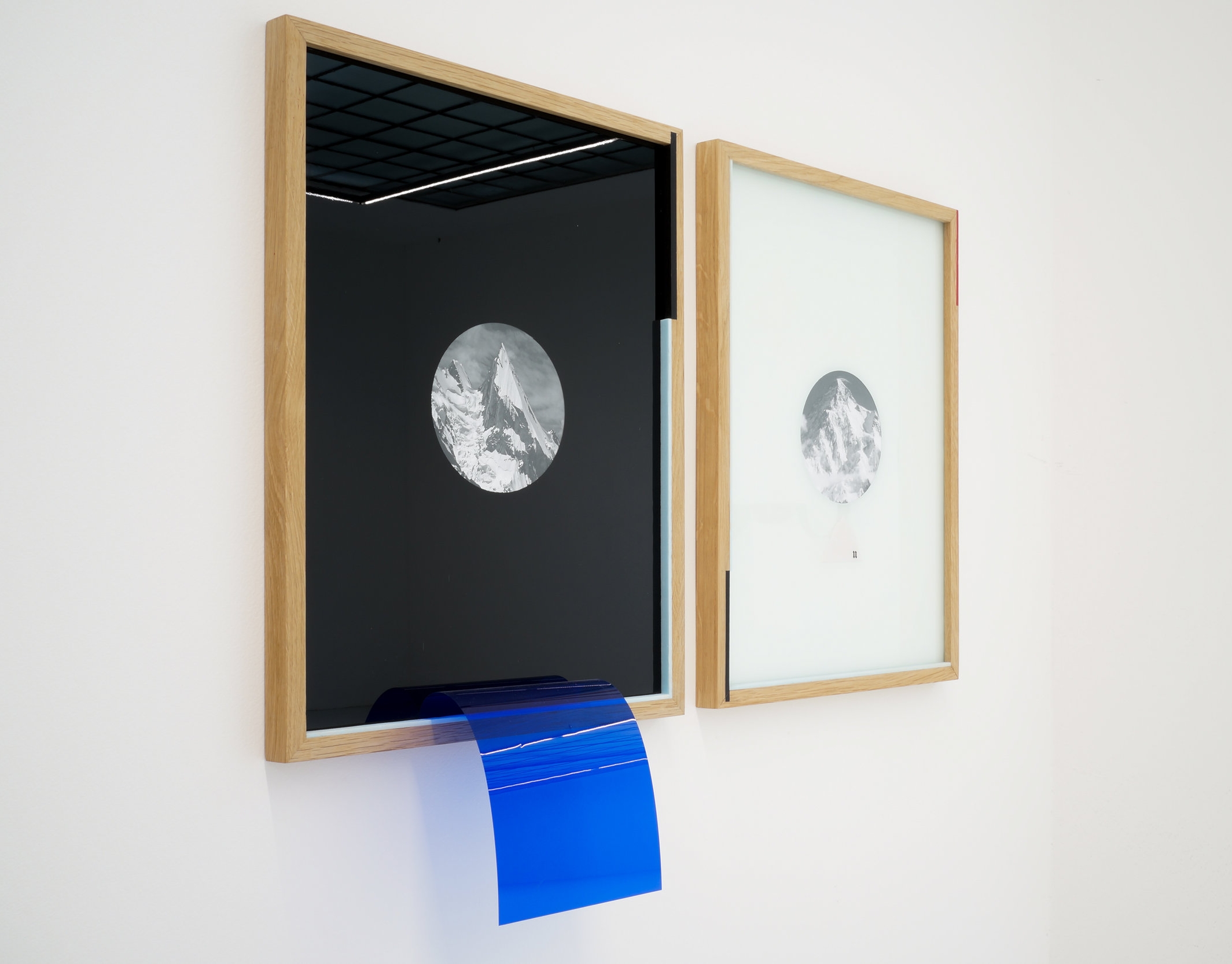 Title: Mountain Head (black) Wood painted frame, blue foam, black paint, blue filter 32cm x 42 cm x 2.2 cm 2016 Title: Mountain Head (white) Wood painted frame, white paint, blue foam 32cm x 42x2.2 2016