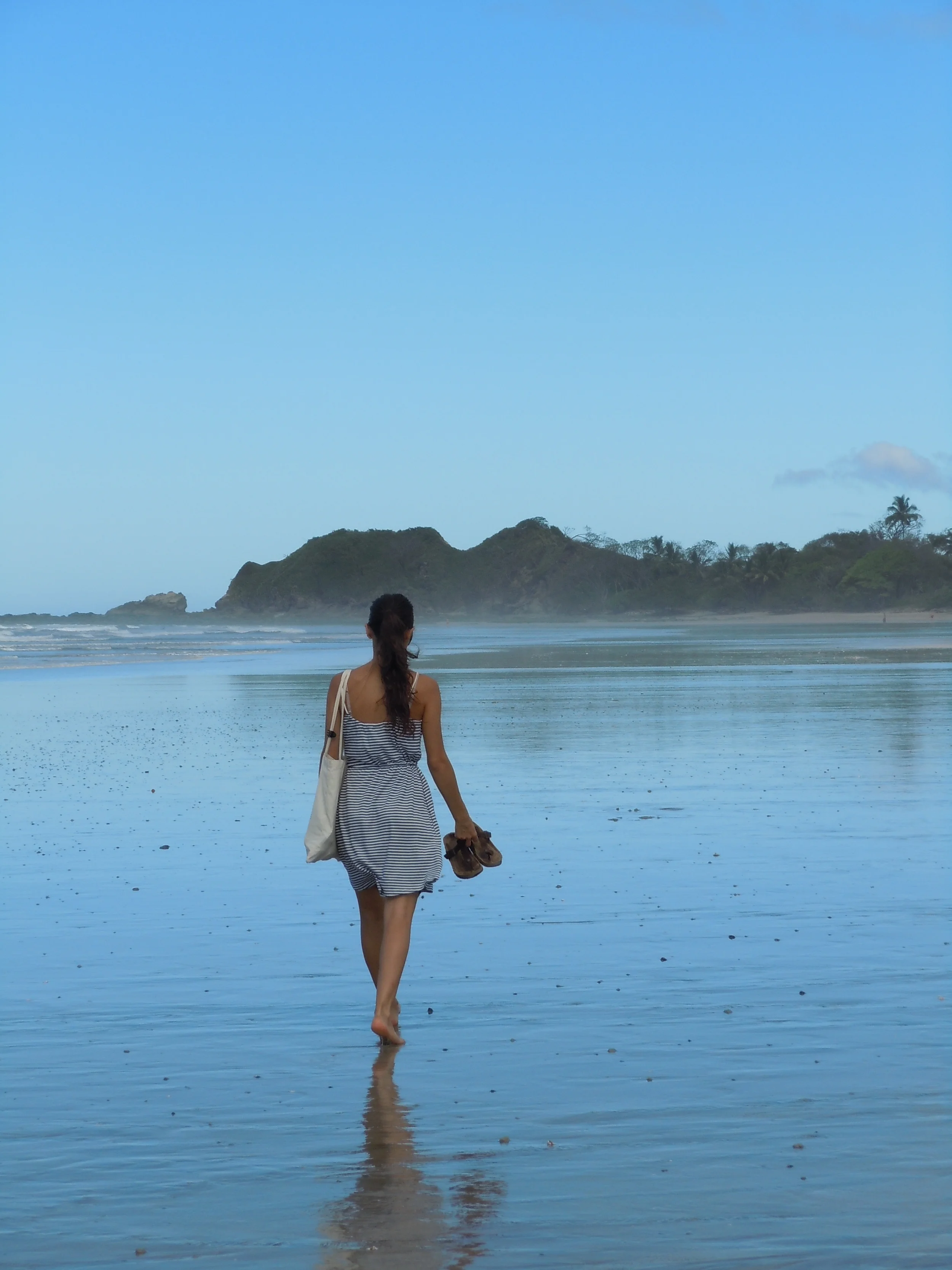 Walking along Playa Guiones.
