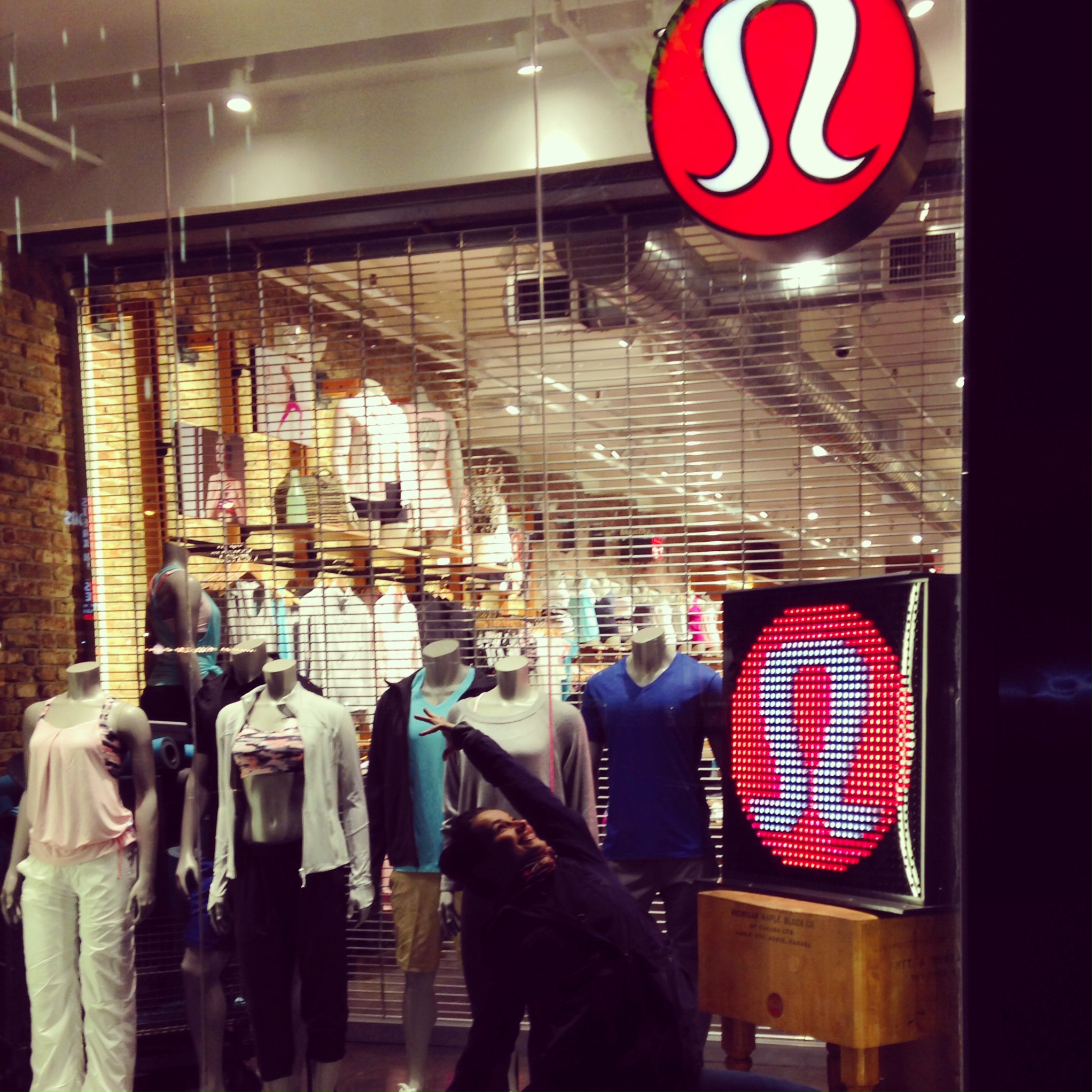 Posing in front of Lululemon.