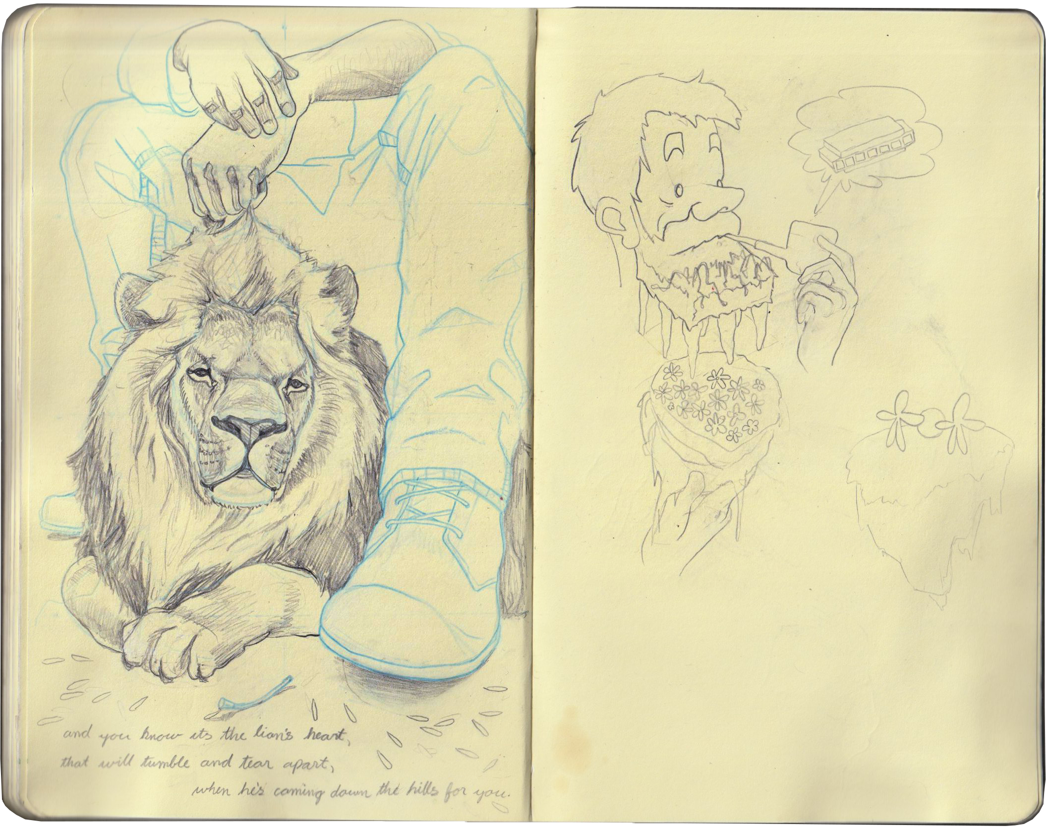 A sketchbook with drawings: on the left, a detailed pencil drawing of a lion lying on the ground, with hands adjusting a shoe over the lion's back; on the right, a simple line drawing of a man with a pipe, a beard, and a thought bubble with a bus, and a drawing of a cake with flower decorations and a drawing of a strawberry shortcake with flowers.