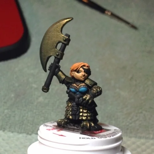 Adding a few mid-highlights of Blighted Gold at the tip of the axe and edges of armor