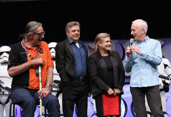 From left to right, Peter Mayhew (Chewbacca), Mark Hamill (Luke Skywalker), Carrie Fisher (Princess Leia), and Anthony Daniels (C-3PO) at Star Wars Celebration 2015.
