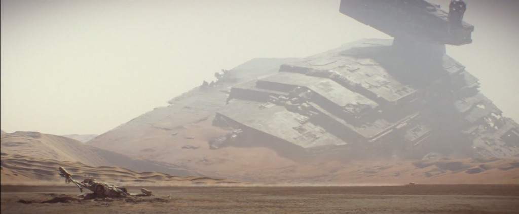 The opening of the trailer shows a crashed Imperial Star Destroyer and an X-Wing on a desert planet, presumably Tatooine.