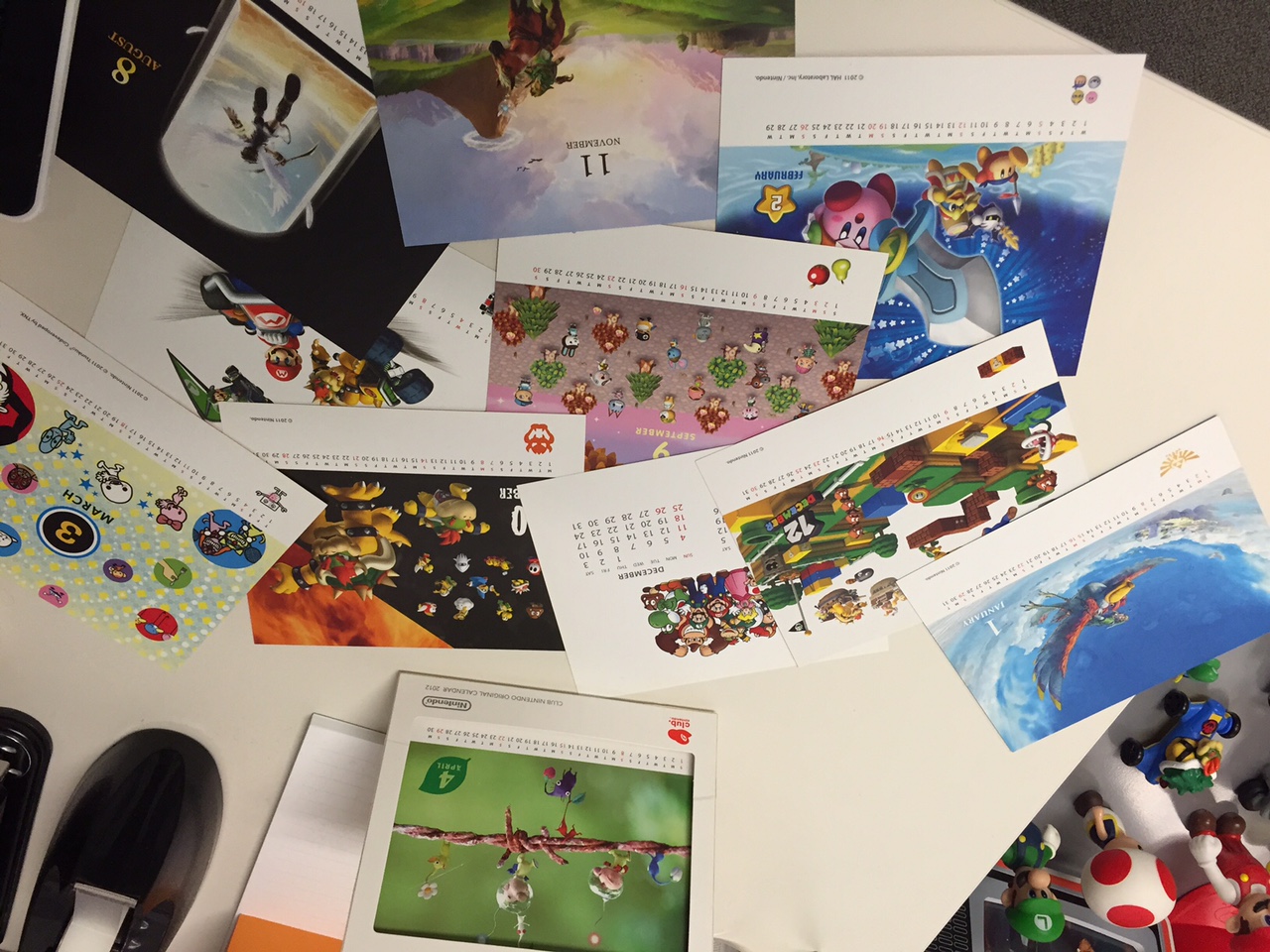 A really cool Club Nintendo desk calendar from 2012 that I still display at work. The dates are wrong, but I love the artwork.