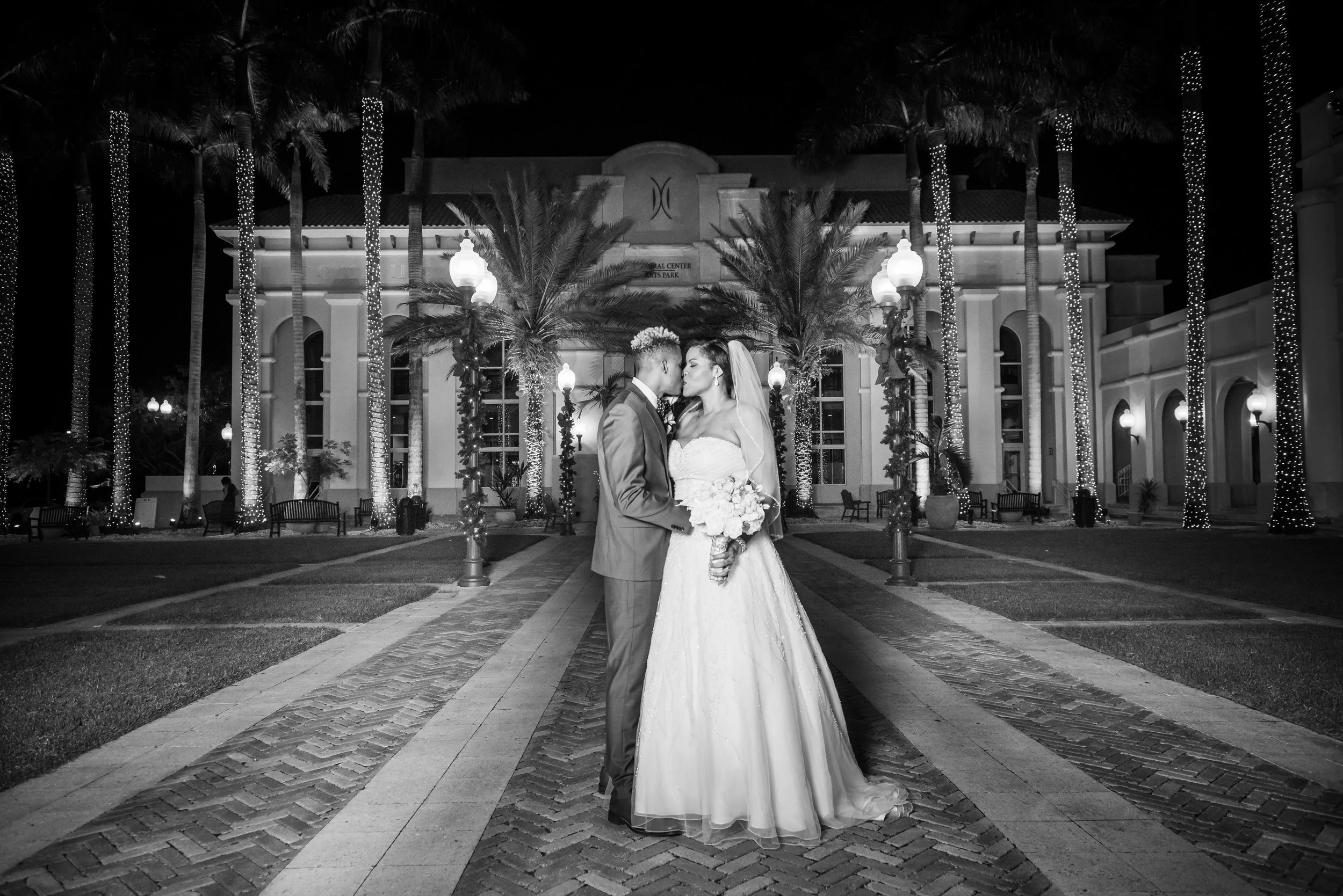 LISTEN! Talia is so so BLESSED, and I do mean BLESSED, at her craft! My husband and I chose to be hands off for the design/decor of our wedding. The most we did was tell her our wedding colors and let her know we wanted minimal flowers. What this AMAZING wedding planner put together was nothing short of spectacular! People looked at me crazy when I told them that my wedding planner was designing the whole thing and that I nor my husband had any clue what the ceremony or reception would look like until THE day. But I trusted and had faith that she would not disappoint based on her previous work and conversations she and I had. I had peace in my soul because I knew she was great at what she does. She also custom designed our cake topper, the designs for our dessert table, menus, etc. She did a surprise reveal for us before the reception and we were beyond pleased and happy. Talia made our wedding one of THE most beautiful weddings I have ever had the pleasure of attending. I received endless compliments at how beautiful and amazing my wedding was from numerous attendees and non-attendees that saw photos and video of my wedding! I told everyone ALL of the credit goes to my wedding planner, Talia. This beautiful soul put together a beautiful wedding and I cannot thank her enough for everything she did for us. If you EVER need a Florida wedding planner that will put together an amazing wedding, support you along the way, always remain pleasant and professional (even when you are freaking out from stress and lack of sleep), pray for you, and keep it allll the way 100 with you... TRUST me when I say, Talia is the only person you need to contact! THANK YOU, THANK YOU, THANK YOU, Talia! Our wedding was so much fun and so amazing that we want to relive that night all over again! I'm so glad we will have our wedding video and plenty of photos to help bring that night to life again. I HIGHLY recommend Talia as a wedding and event planner. She is blessed with a special gift. Nalishia + Jacques