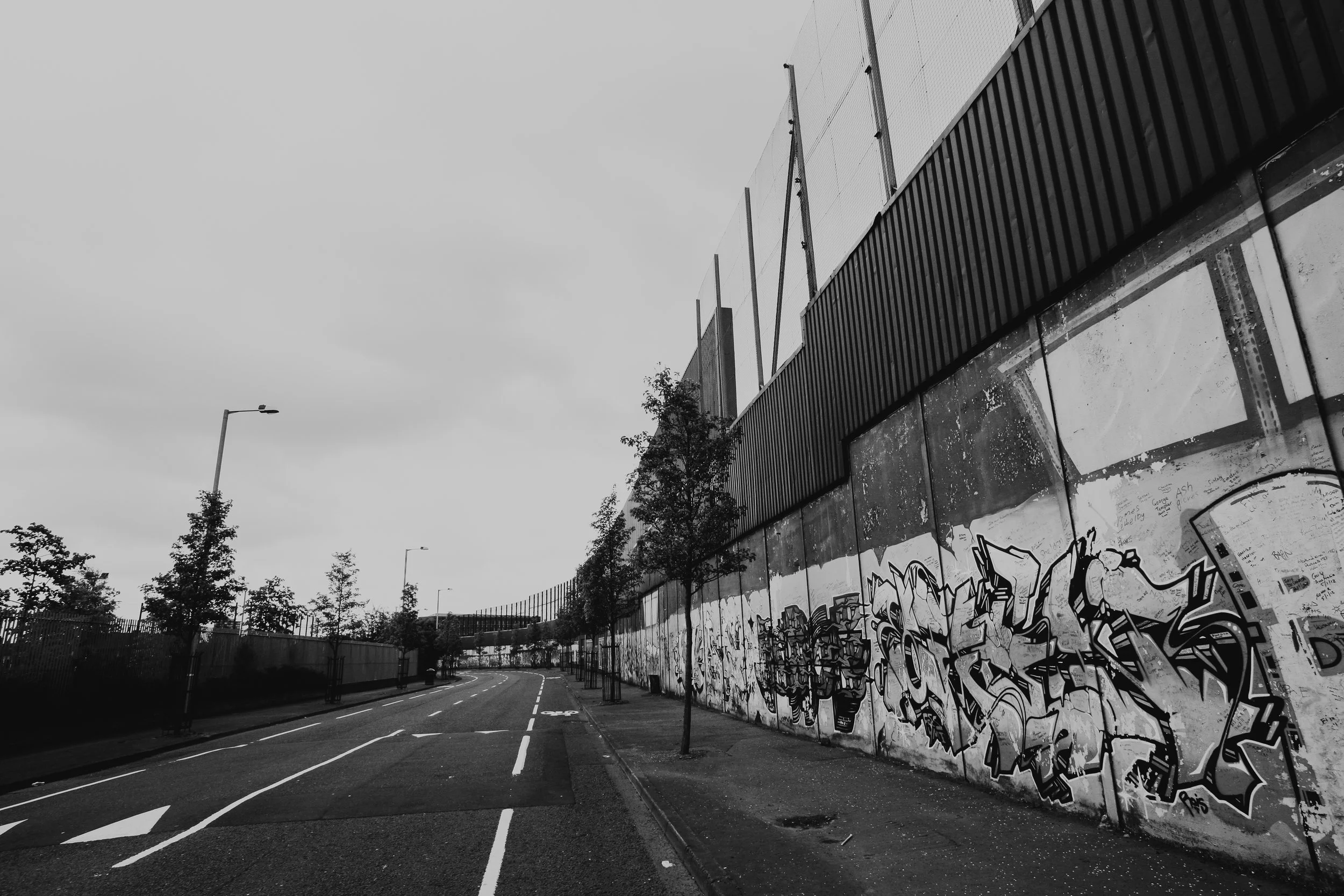 The Peace Wall - Catholic Side /// That separate predominantly Republican and Nationalist Catholic neighborhoods from predominantly Loyalist and Unionist Protestant neighborhoods.