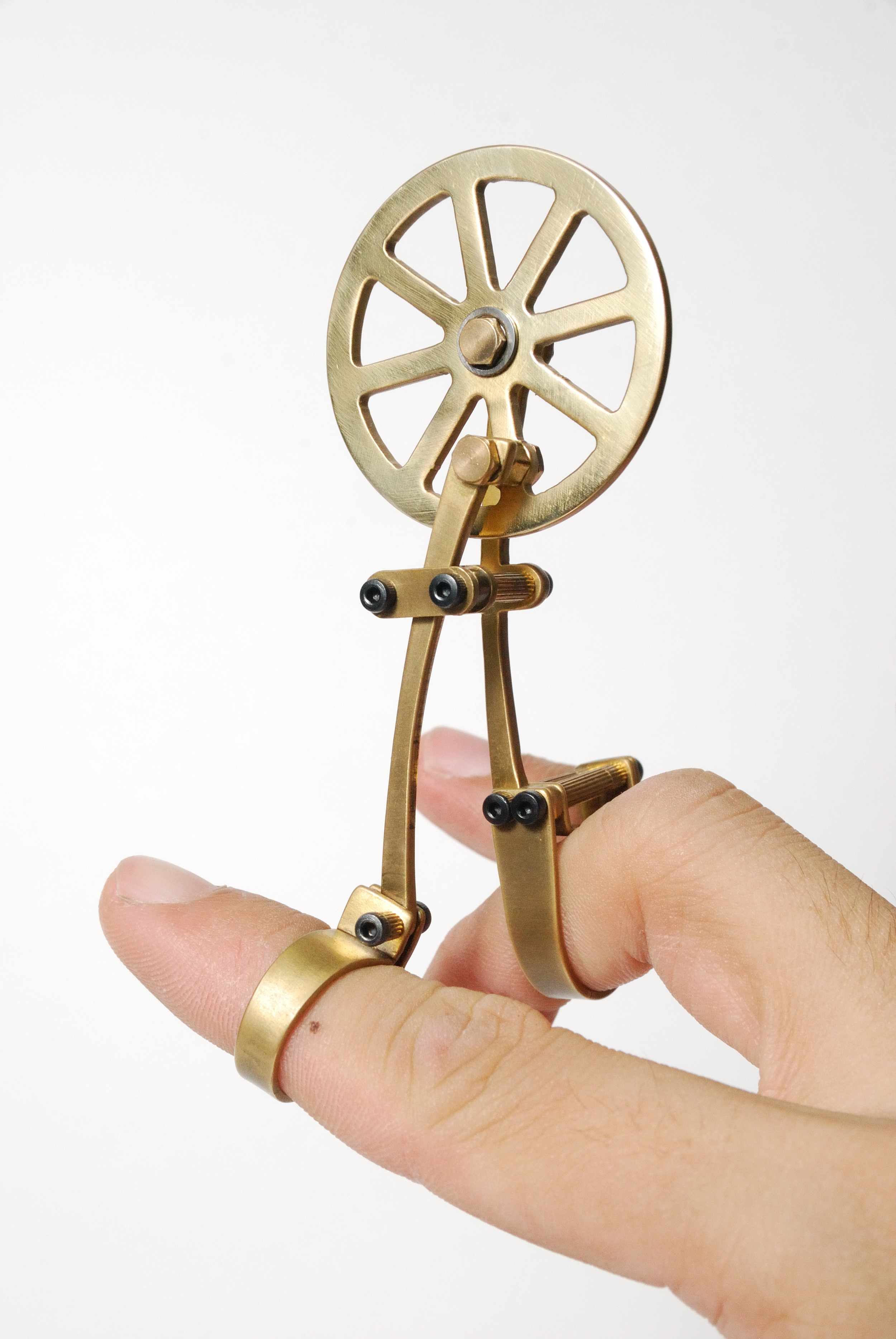 THE CHINESE DREAM OF TRAIN - LIMITATION OF BODY MOVEMENT (3), 2014 Finger-piece Brass, Stainless Steel