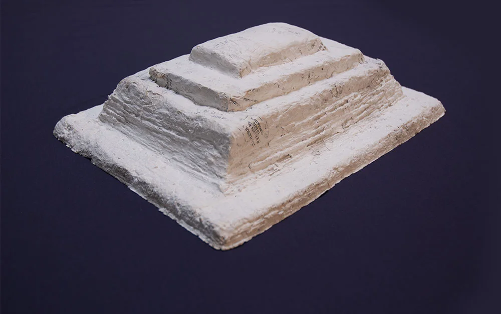 Lisa Blas Engagements, monumental or otherwise , Detail. Plinths and horseshoes cast from shredded documents (military, financial, personal), Celluclay, plaster, clove oil, glue, RIT dye, ceramic powder, acrylic paint and gold dust. 2006 - 2008