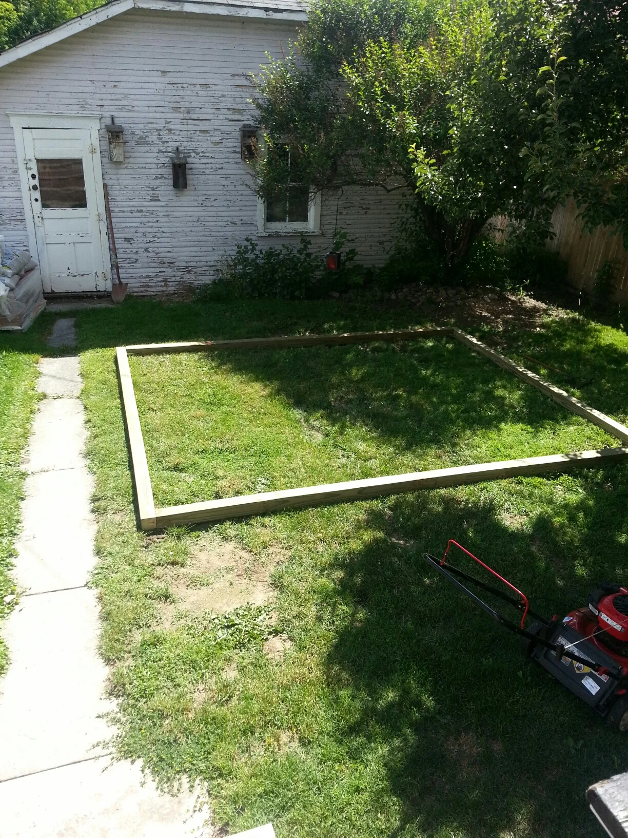 Treated lumber joined to desired size using galvanized screws.