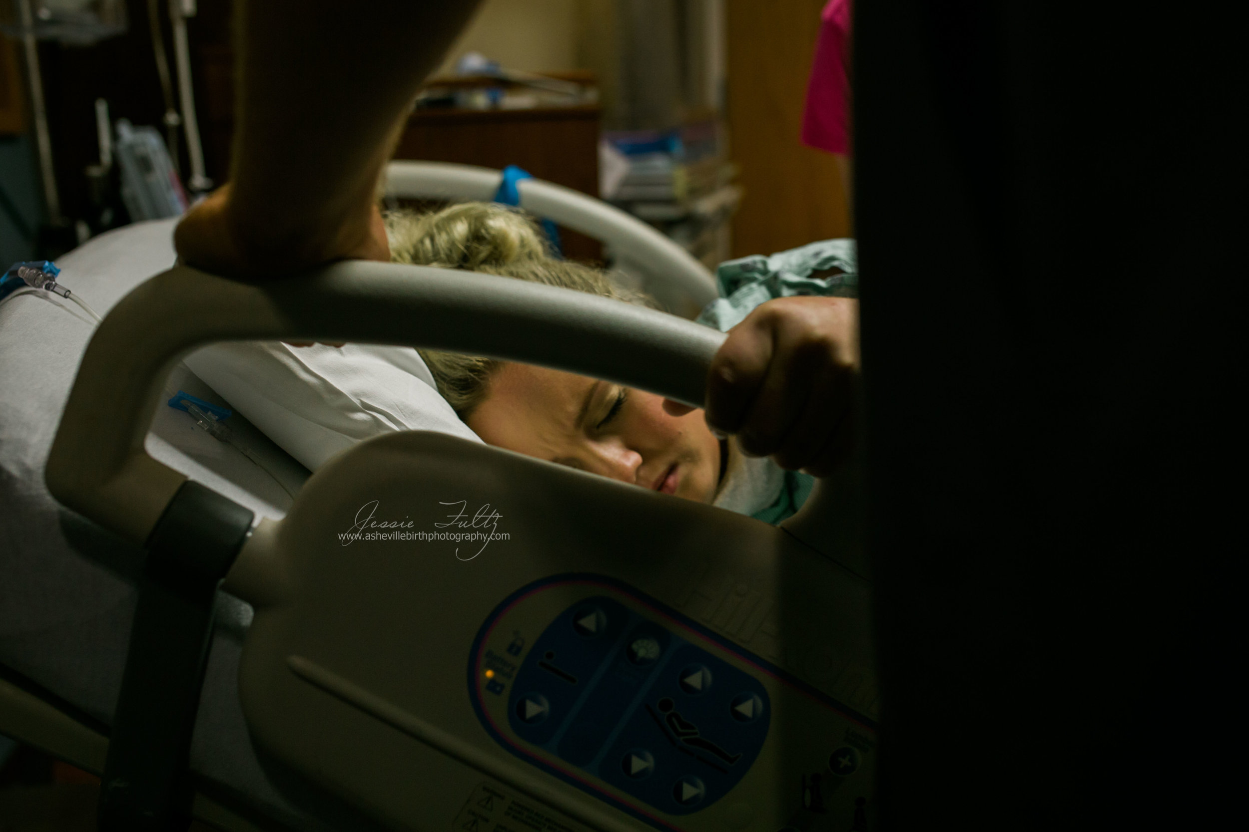 the view of a laboring woman from the side of her hospital bed