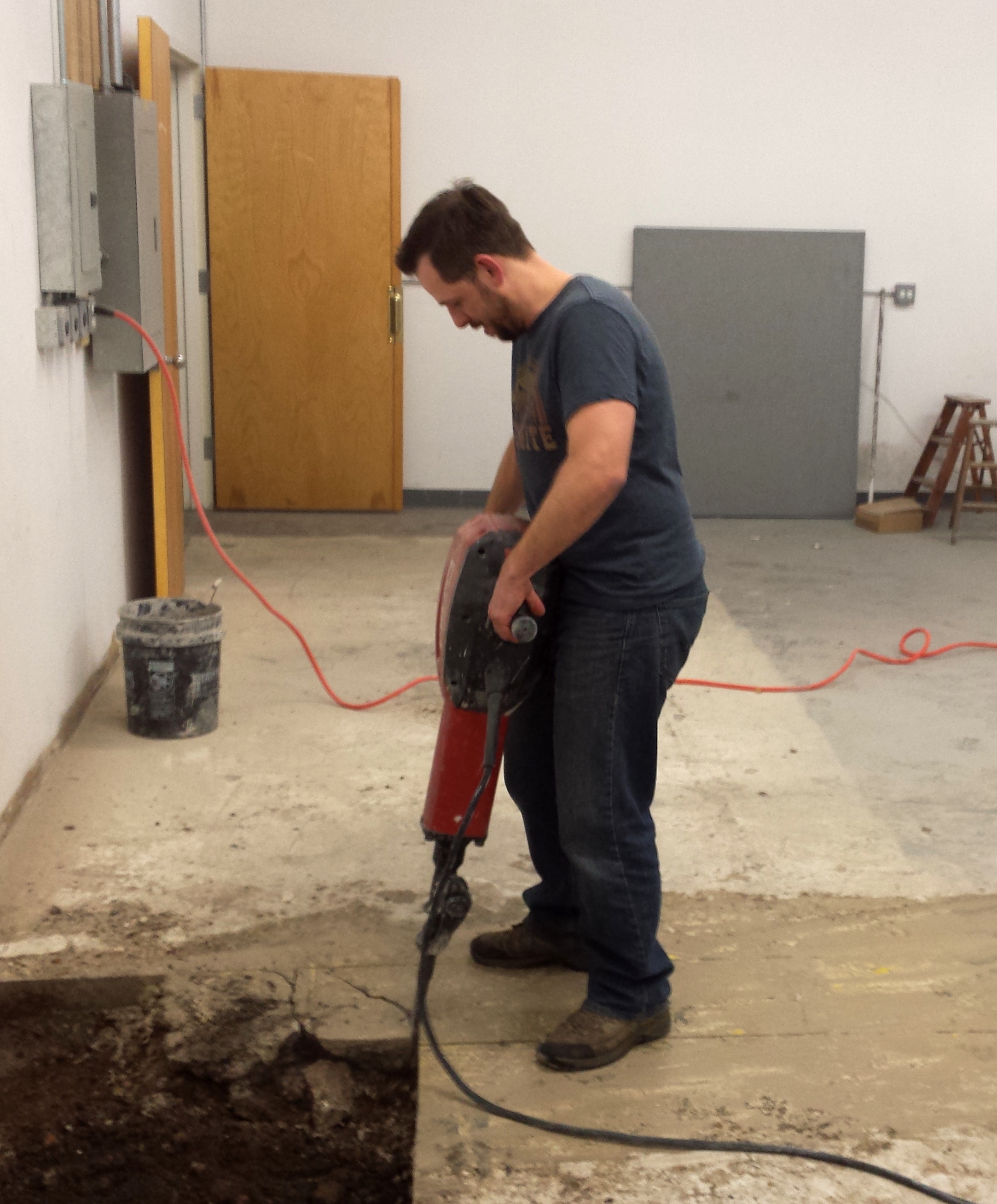 Cesar prepping for the floor drain way back in the spring.