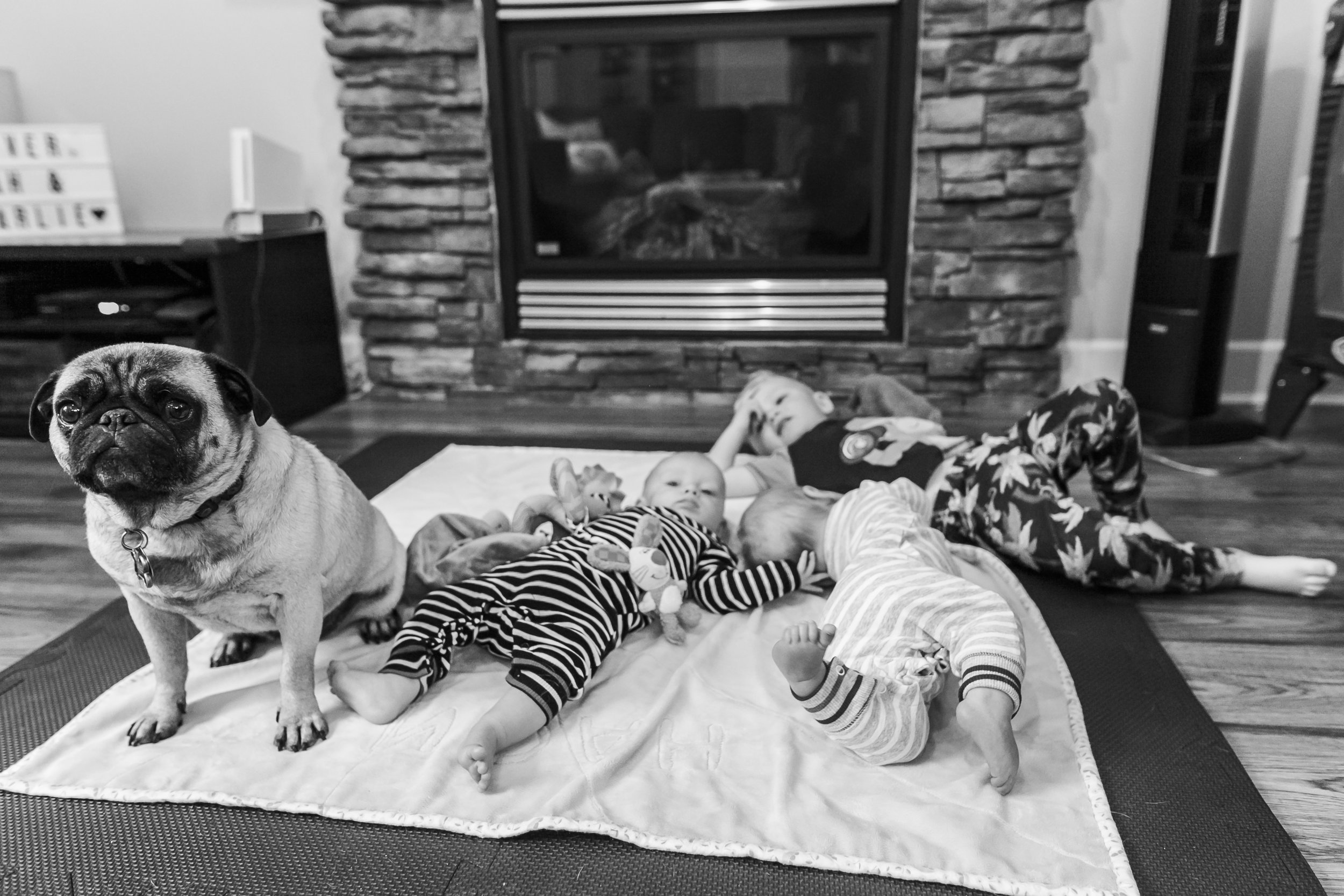 Surrey Family photographer. Vancouver family photographer, klutch Photography, documentary photography, candid photography, kids laying on a mat