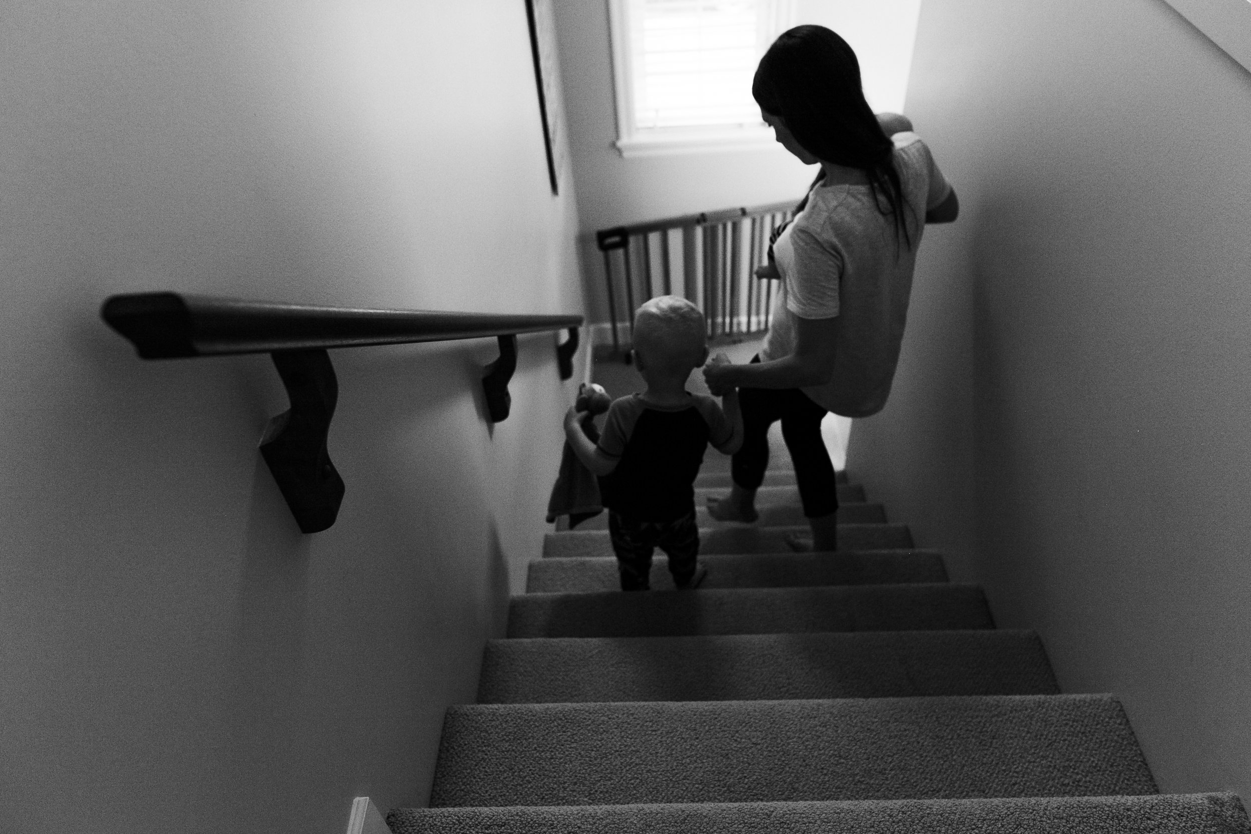 Surrey Family photographer. Vancouver family photographer, klutch Photography, documentary photography, candid photography, mom going down the stairs