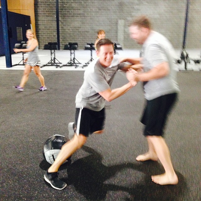 Friday's musical wall ball's warm-up got a little competitive