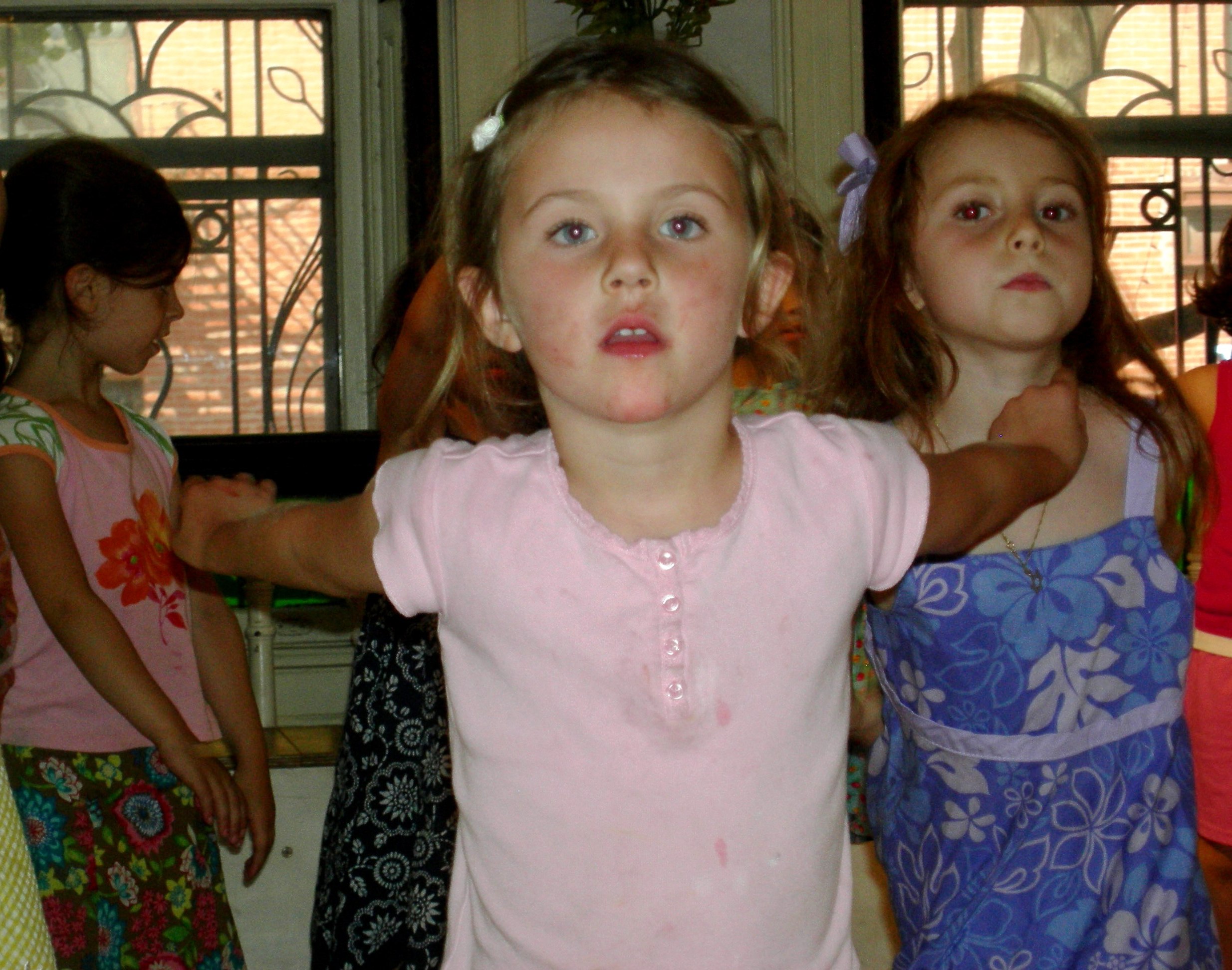 Lila preparing to fly during her first year of Erin's Creative Movement class at Spoke the Hub Dancing in 2007.