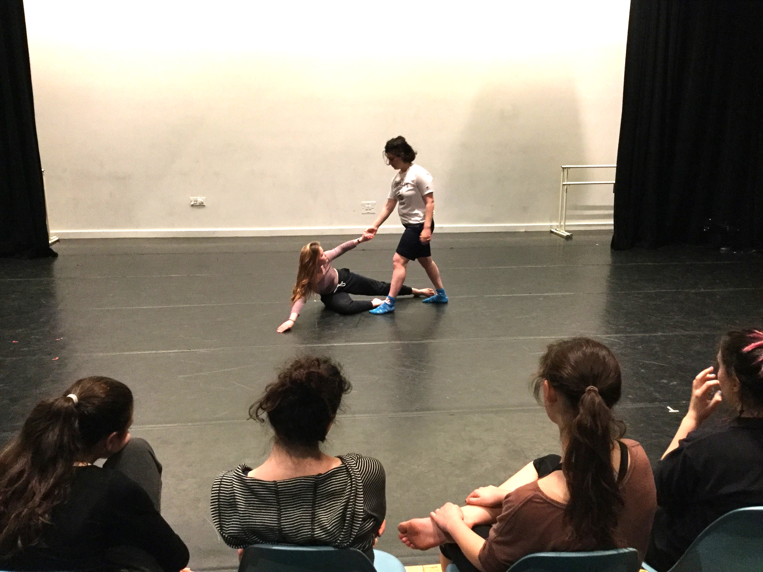 Katie and Zoe rehearsing on stage at the Actors Fund Arts Center - fellow dancers watch their run-through