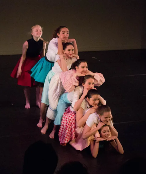 Angela in 2015 e.g.dance student performance (3rd from top)