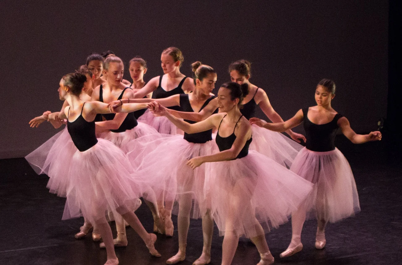 Claire (center) in e.g.dance performance in May 2017.