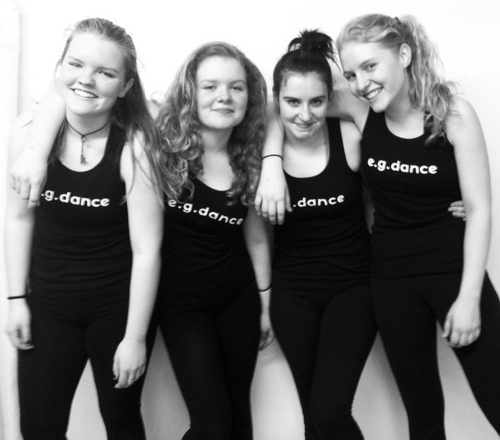 Claire (second from left) with fellow dancers and her sister, Katie (left)