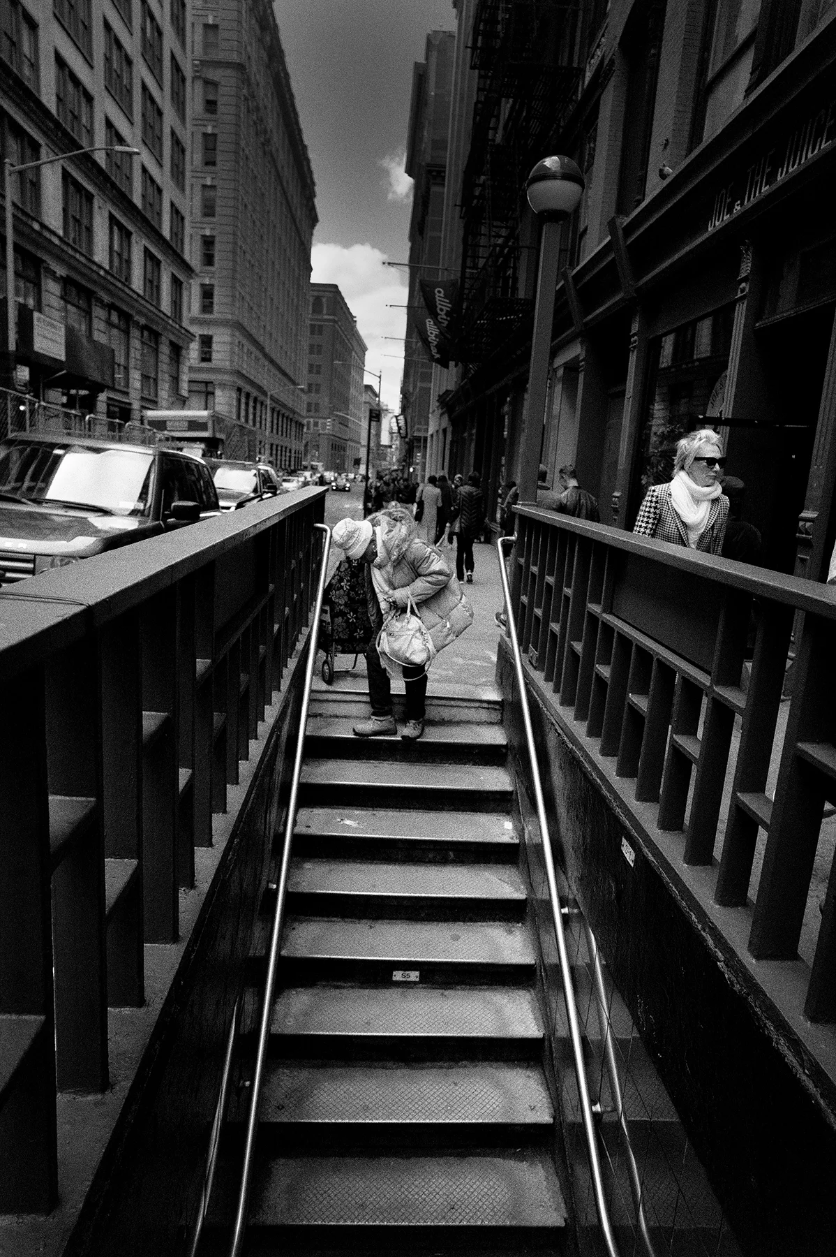 womansubwaystairs.jpg
