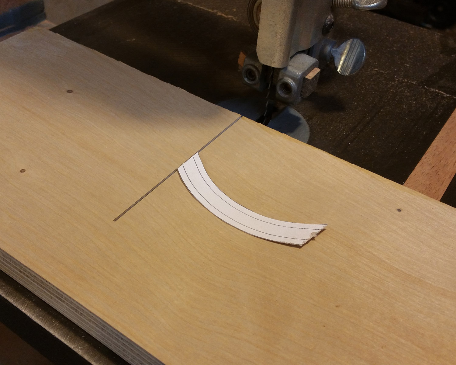 Make a sled for the bandsaw, and position your cut-out pattern as shown.