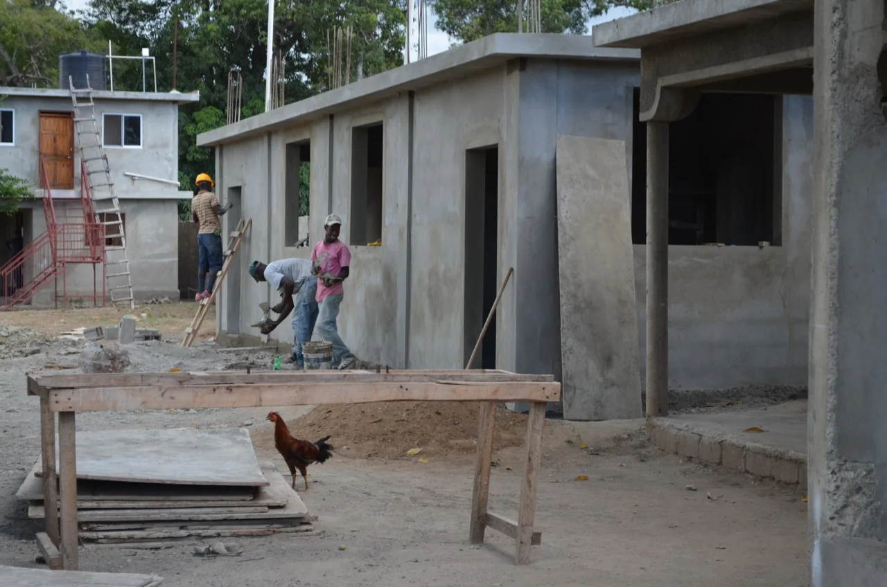 local masons putting the final touches on yogurt and cheese production building
