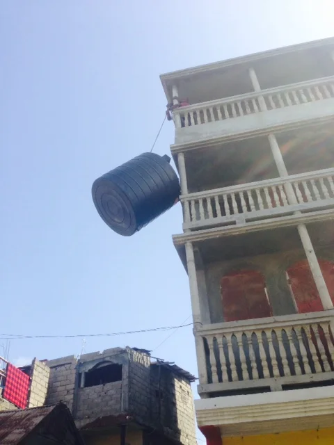 Purchasing a water reservoir from a depot in town