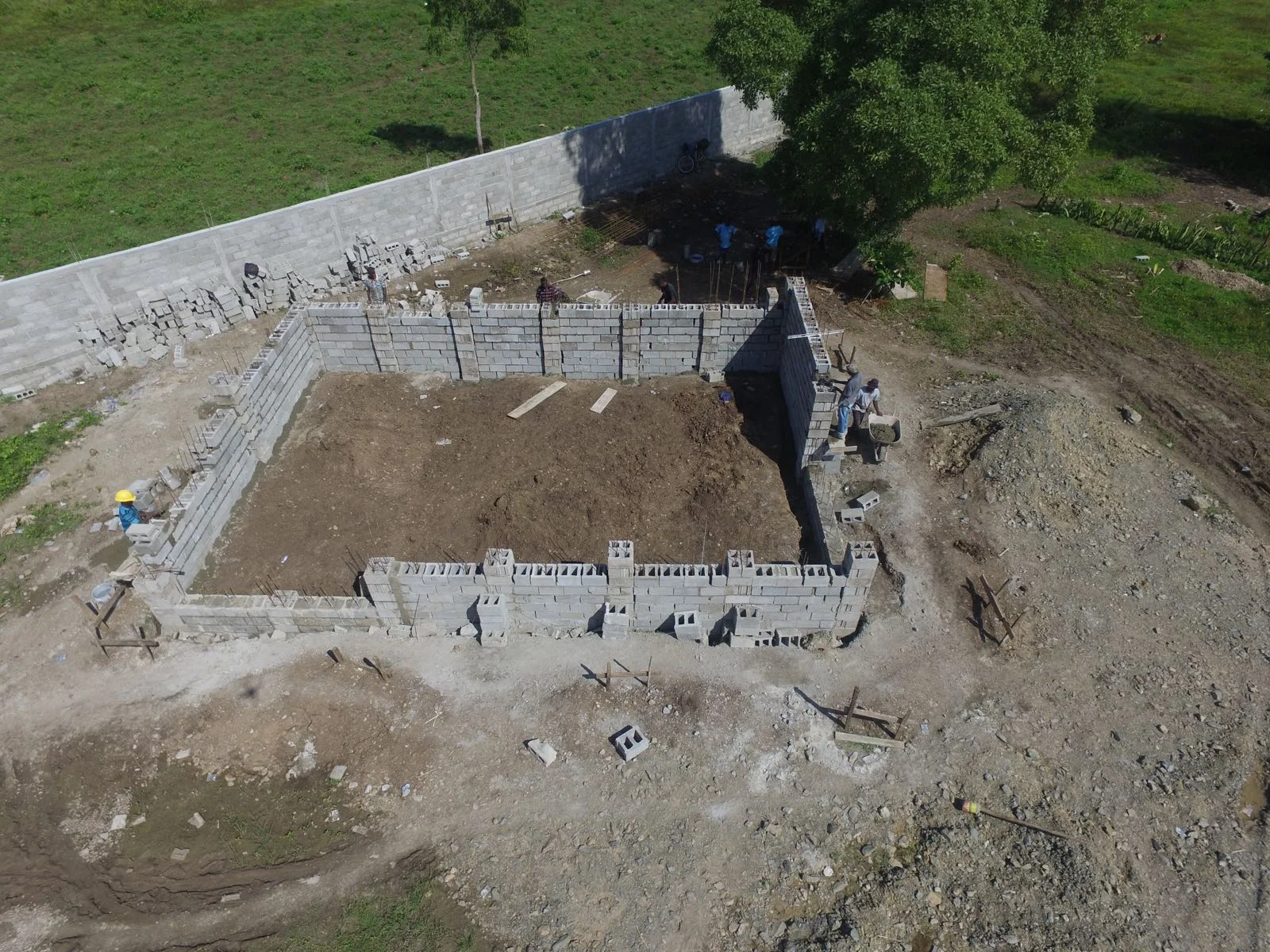 The walls of the Education Building rise. 
