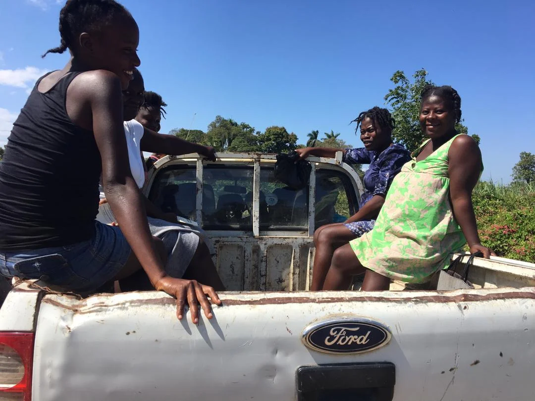During the week of lockdown, women have been getting creative with transportation to the Strong Start Maternity Center, doing anything necessary to make sure their pregnancies are on track. Here women ride in a truck that will only be able to take them so far on backroads before they reach roadblocks and have to descend on foot.