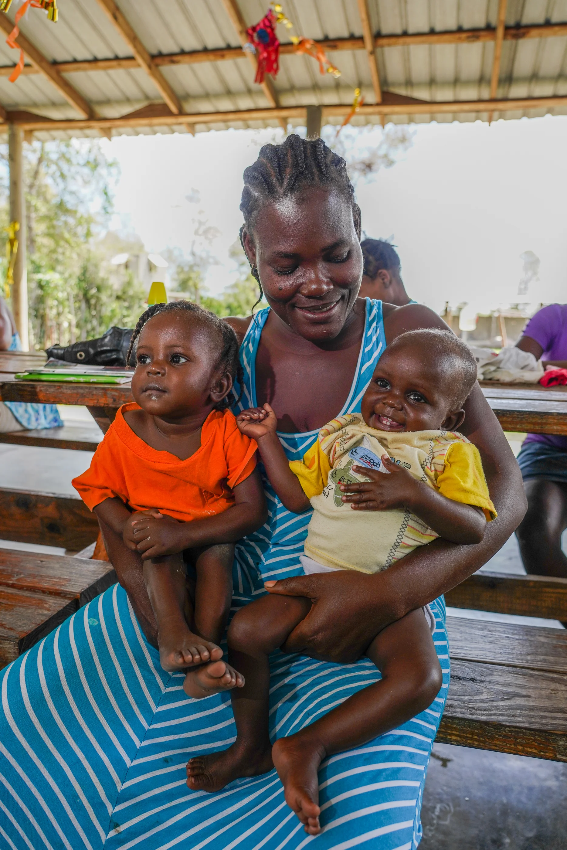 A happy Celisnord-Michel family in recovery from severe acute malnutrition