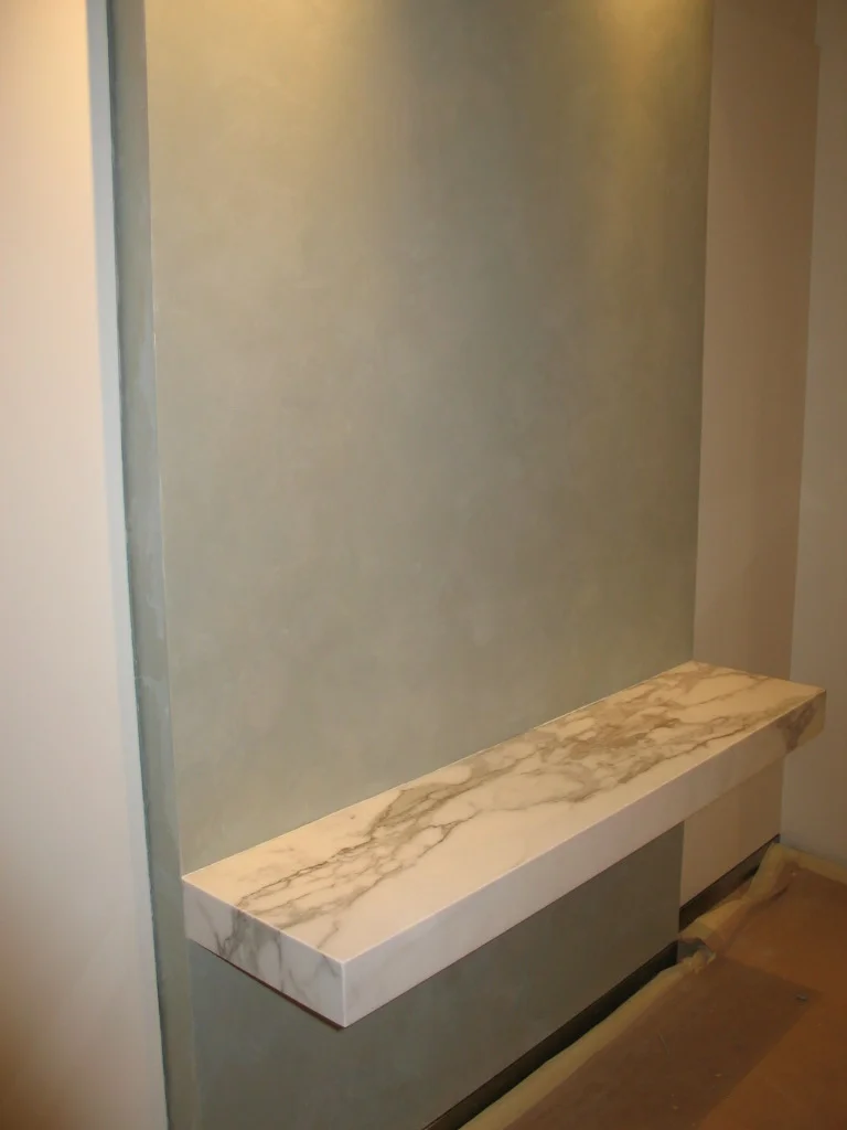 Faux Venetian plaster on feature wall, elevator lobby.