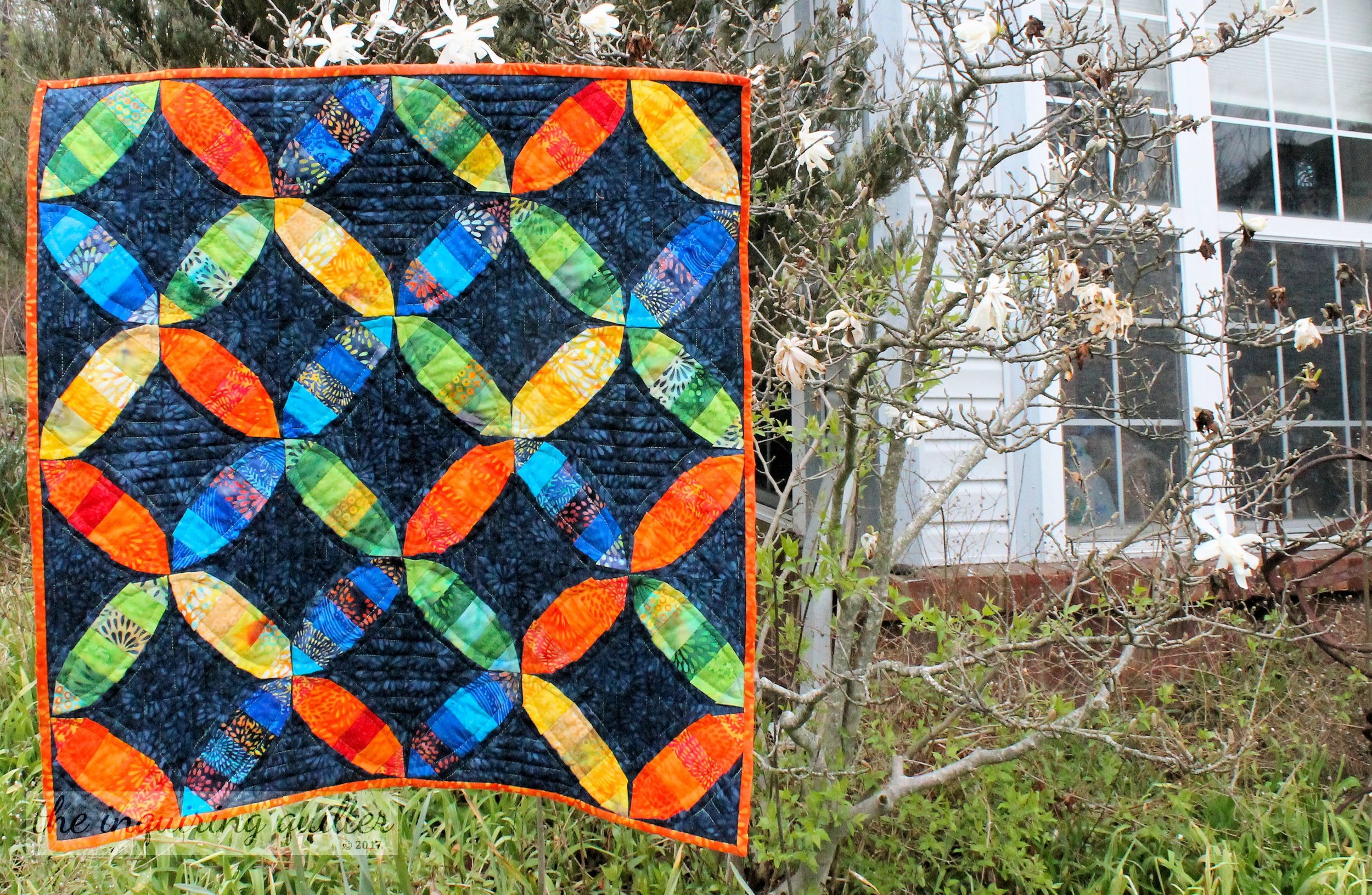 I used foundation piecing and fabrics from the Pressed Petals collection to make my mini quilt for March's Mini Madness