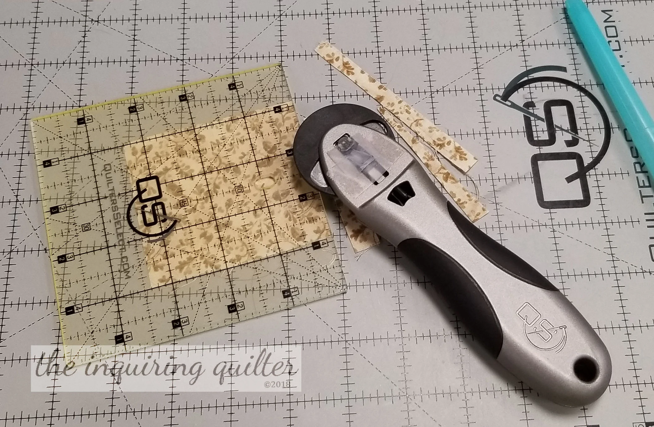 The minute I saw these Quilter Select non-slip rulers and mats at Market, it was love at first sight! You can trim one side of a square, press and turn, and the ruler holds onto the fabric perfectly so you can trim the other side.