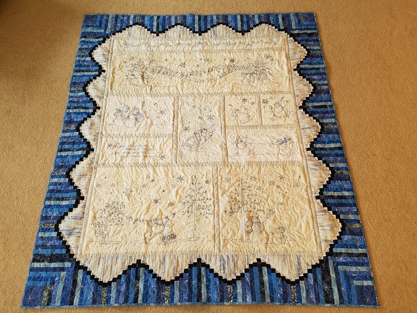 Deanna's embroidered snowmen quilt from Week 17